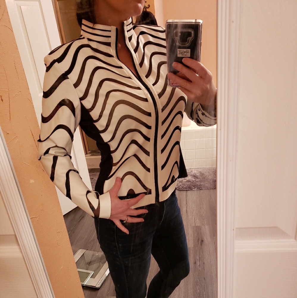 Frank Lyman white leather and mesh jacket.
